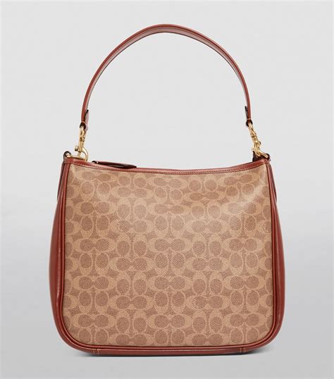 coach cary shoulder bag dupe|luxury handbag dupe.